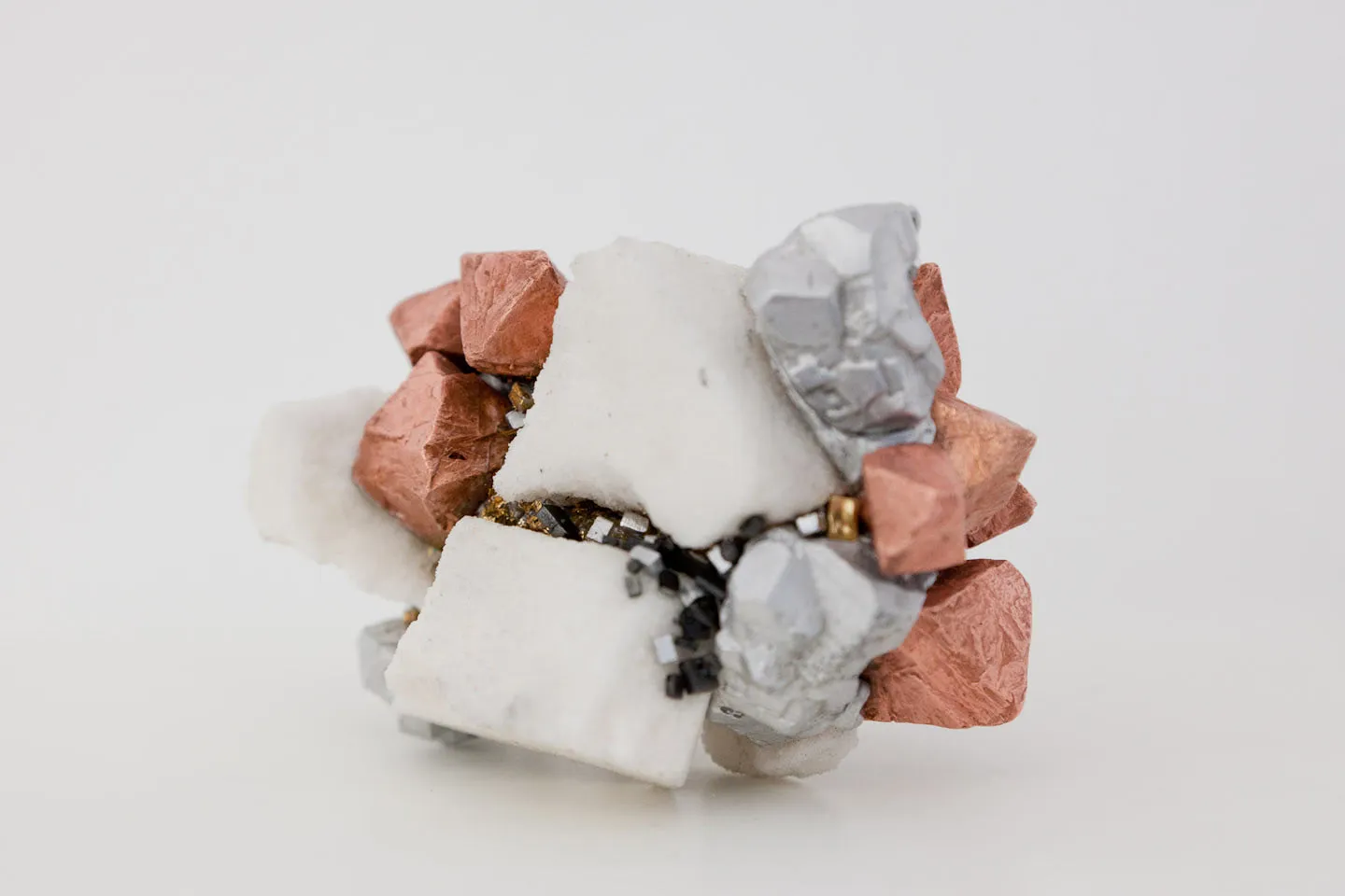 H / AlCuTaAu: a New Artificial Mineral