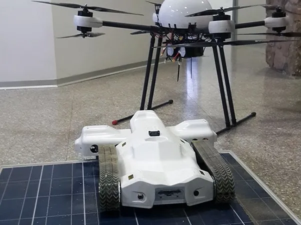 Drones and Robots Co-Work in Solar Farms