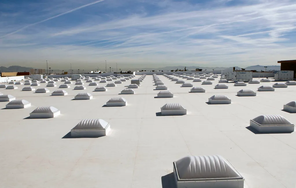 Cooling buildings with ultra-white paint